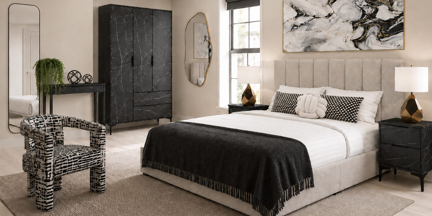 Black marble bedroom hero with patterned accent chair